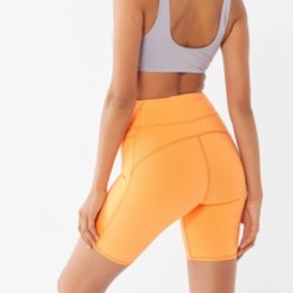 UO Seamed Biker Short in Coral - Picture 2 of 5